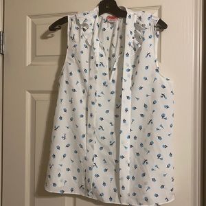 Kate Spade top. White with blue flower print. Size large.